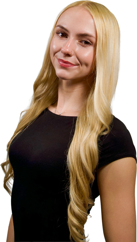 Studio headshot of Bethany Flora smiling